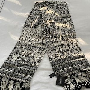 Beautiful print silk scarf. Brand new with tags.  68” long by 10” wide.